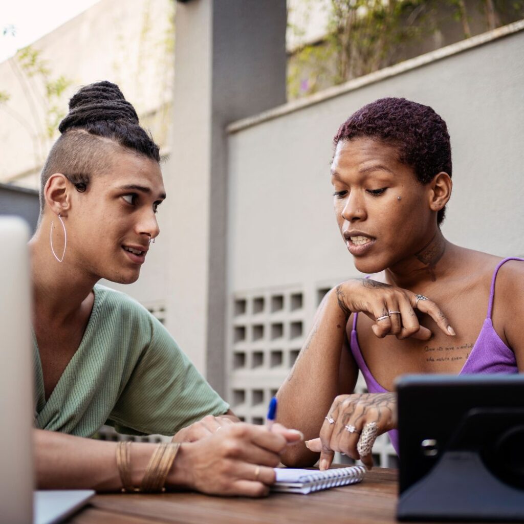 Two transgender colleagues working together