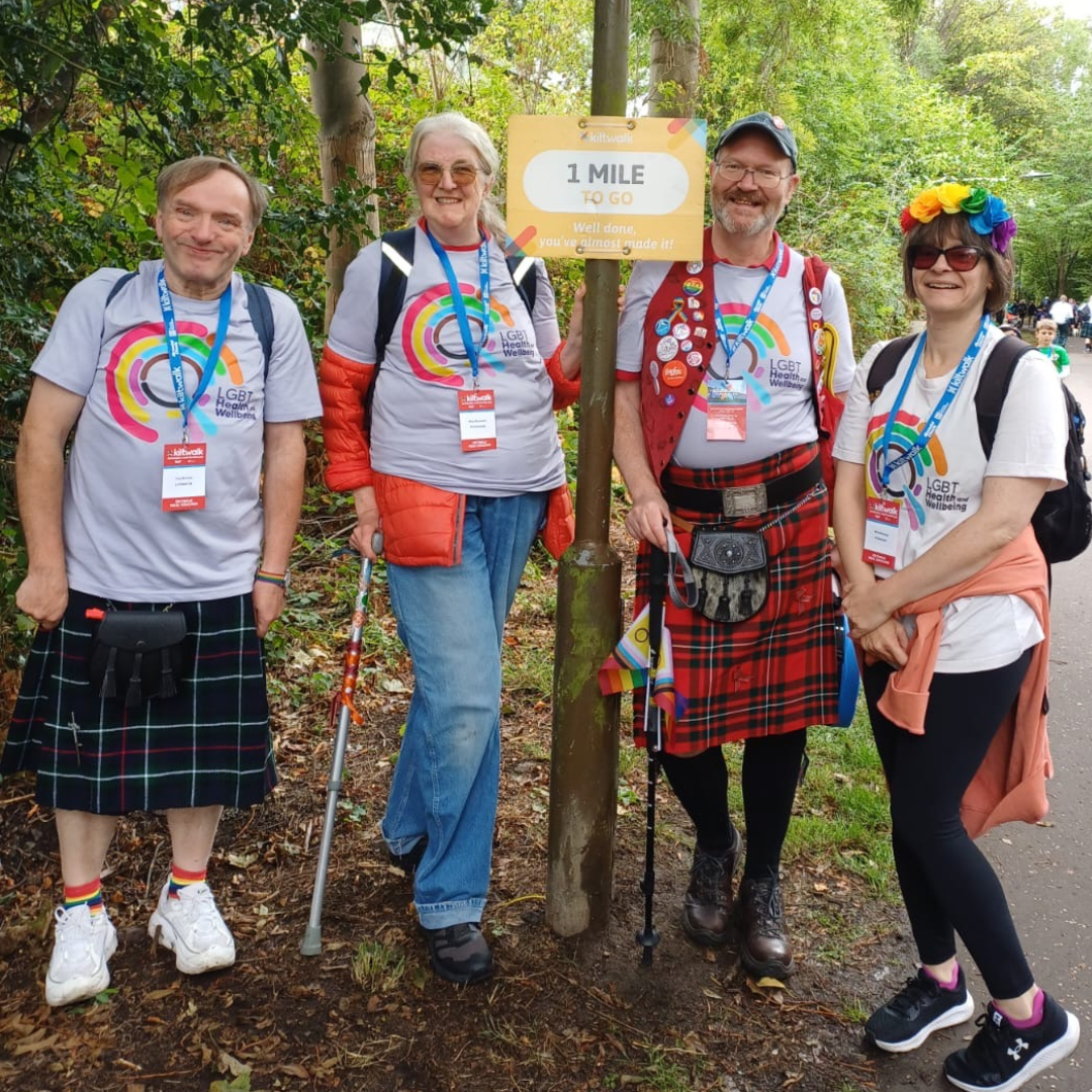 4 community members fundraising for LGBT Health and Wellbeing at Edinburgh Kiltwalk wearing branded Tshirts